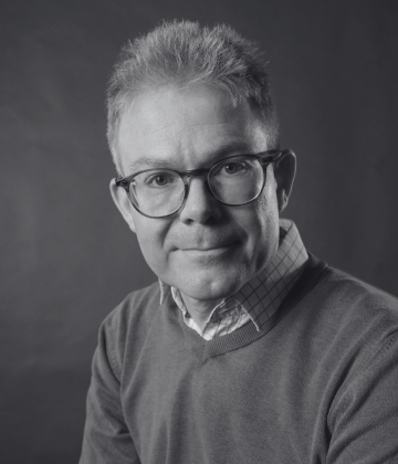 Headshot of our board member Guy Parker