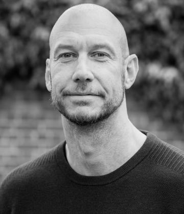 Black and white image of Paul Winyard, head of Policy