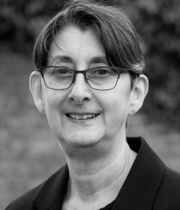 Black and white image of Nikki Renken, Head of Casework