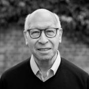 Black and white image of Gerald Oppenheim smiling